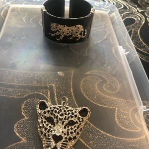 Bracelet cuff and a pendant